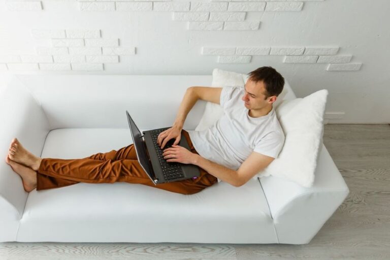 Man relaxing on PC